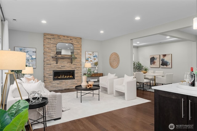 1221 199th St SE, Bothell, WA 98012 - living area featuring dark wood-style flooring, recessed lighting, and a fireplace