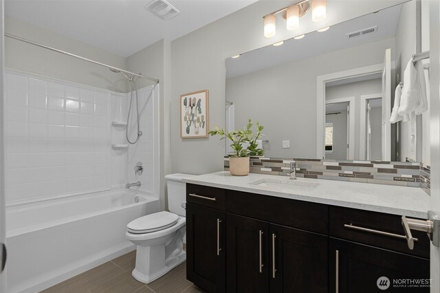 1221 199th St SE, Bothell, WA 98012 - full bath with backsplash, vanity, toilet, and shower / tub combination