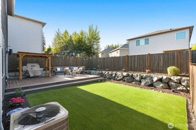 1221 199th St SE, Bothell, WA 98012 - view of yard featuring central air condition unit, an outdoor living space, and a deck