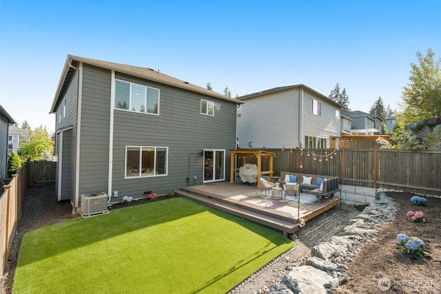 1221 199th St SE, Bothell, WA 98012 - back of property featuring a wooden deck, cooling unit, and outdoor lounge area