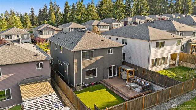 1221 199th St SE, Bothell, WA 98012 - rear view of property featuring a deck, a residential view, and a shingled roof
