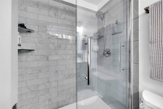 215 100th St SW Unit B307, Everett, WA 98204 - bathroom featuring a shower stall and toilet