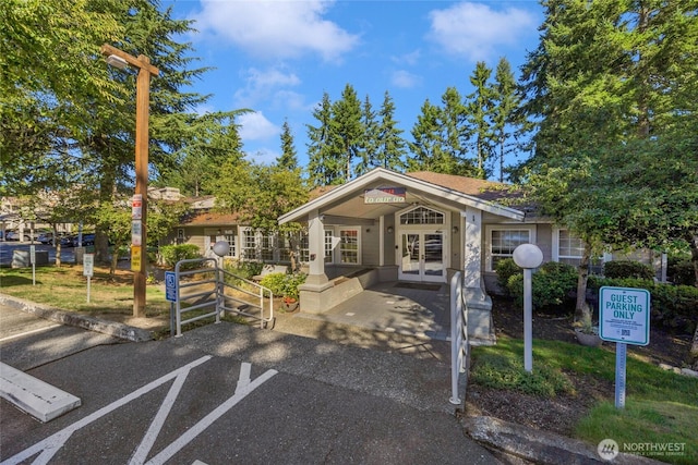 215 100th St SW Unit B307, Everett, WA 98204 - view of front of house with french doors and uncovered parking