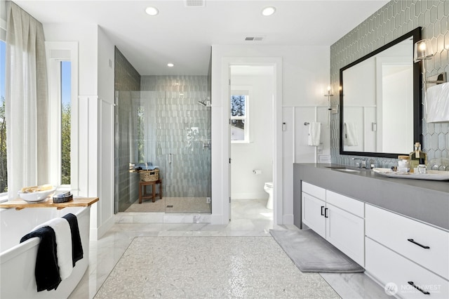 full bathroom featuring visible vents, a stall shower, toilet, recessed lighting, and vanity