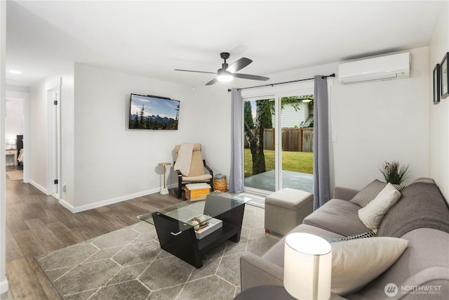 living room with a ceiling fan, baseboards, recessed lighting, wood finished floors, and a wall mounted AC