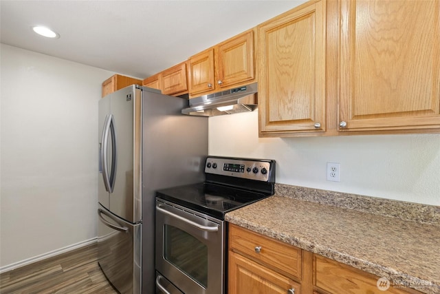 kitchen with under cabinet range hood, stainless steel electric range oven, dark wood-type flooring, baseboards, and light countertops