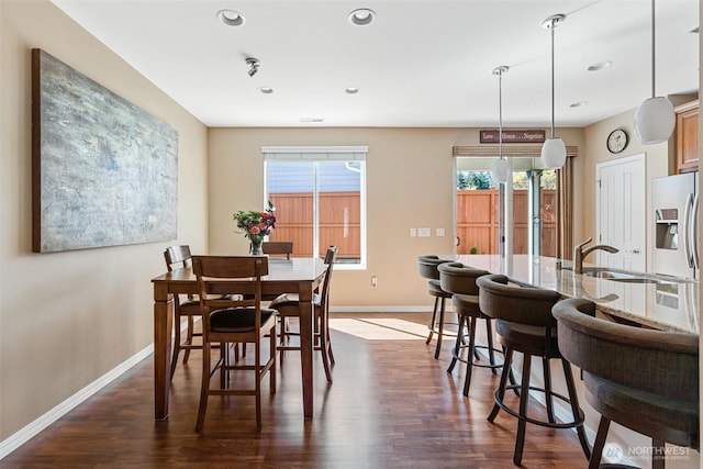 dining area featuring baseboards, recessed lighting, and dark wood-style floors