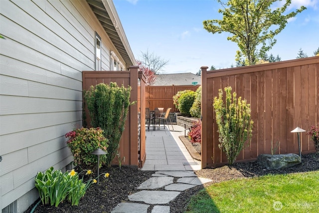 view of yard with a patio and fence