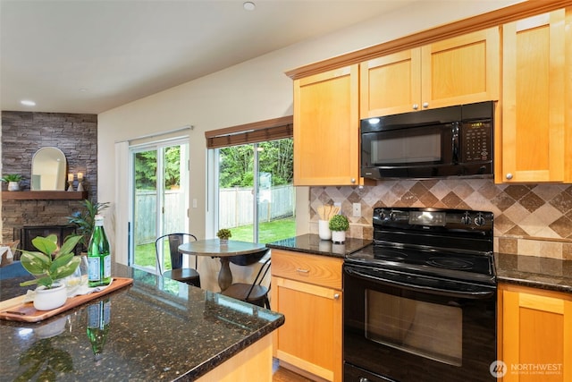 3639 Reagan Ave, Bremerton, WA 98310 - kitchen featuring black appliances, tasteful backsplash, and dark stone countertops
