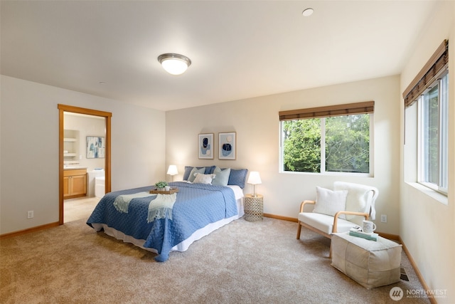 3639 Reagan Ave, Bremerton, WA 98310 - bedroom with light colored carpet, baseboards, and ensuite bathroom