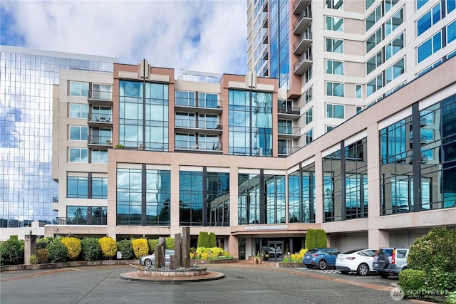177 107th Ave NE Unit 1501, Bellevue, WA 98004 - view of apartment building / complex with uncovered parking