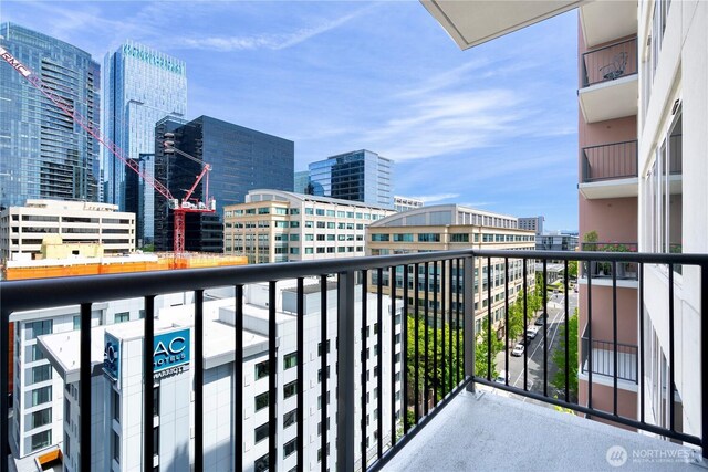 177 107th Ave NE Unit 1501, Bellevue, WA 98004 - balcony featuring a view of city