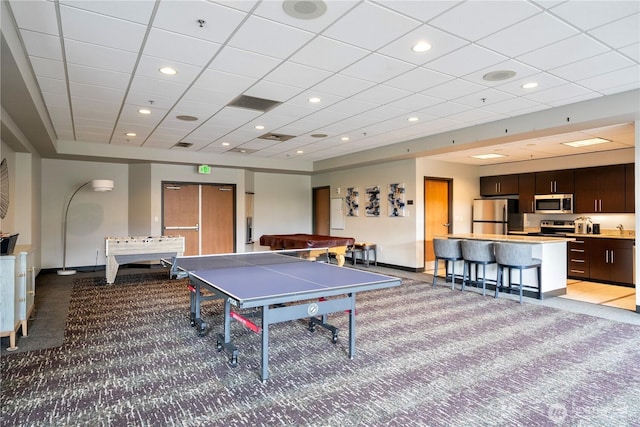 177 107th Ave NE Unit 1501, Bellevue, WA 98004 - recreation room featuring light colored carpet, baseboards, recessed lighting, and a paneled ceiling