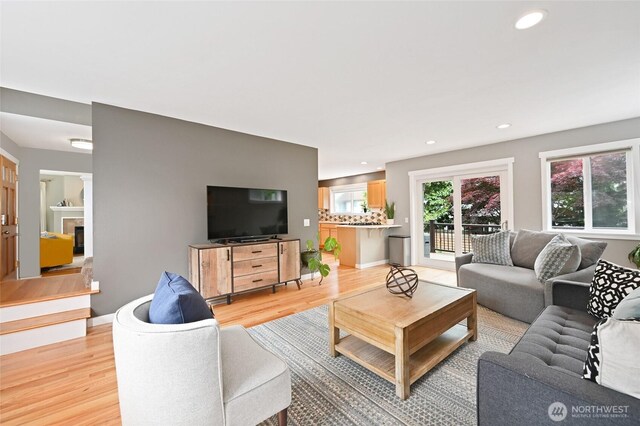 10839 35th Ave SW, Seattle, WA 98146 - living area featuring light wood-style flooring and recessed lighting
