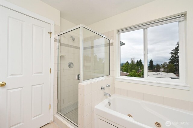 10839 35th Ave SW, Seattle, WA 98146 - bathroom featuring a shower stall and a whirlpool tub