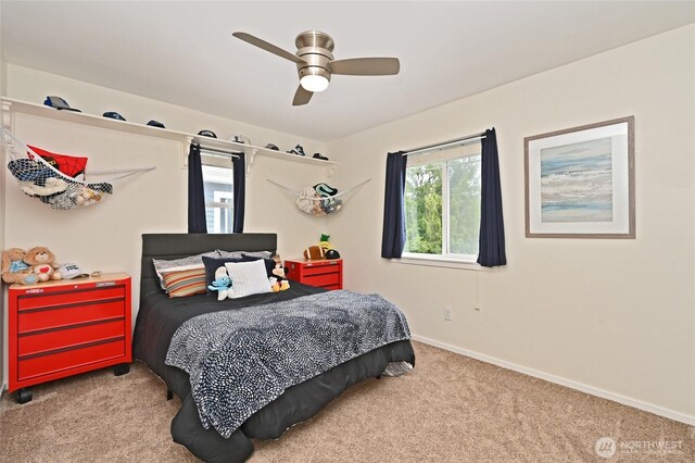 10839 35th Ave SW, Seattle, WA 98146 - bedroom featuring carpet flooring, baseboards, and a ceiling fan