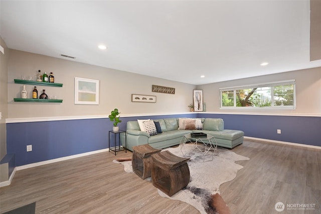 10839 35th Ave SW, Seattle, WA 98146 - living room featuring wood finished floors, baseboards, and recessed lighting
