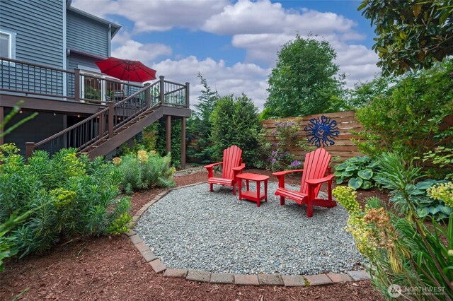 10839 35th Ave SW, Seattle, WA 98146 - view of yard featuring stairway, a wooden deck, and a patio