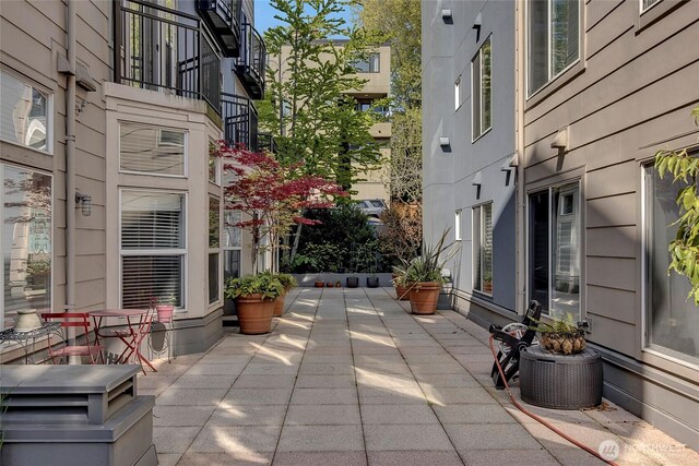 view of home's community featuring a patio area