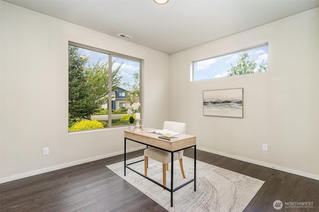 office area featuring baseboards and dark wood-style floors