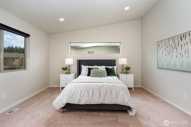 bedroom featuring light colored carpet, baseboards, and recessed lighting