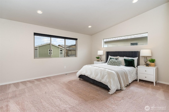 bedroom featuring light colored carpet, baseboards, multiple windows, recessed lighting, and vaulted ceiling
