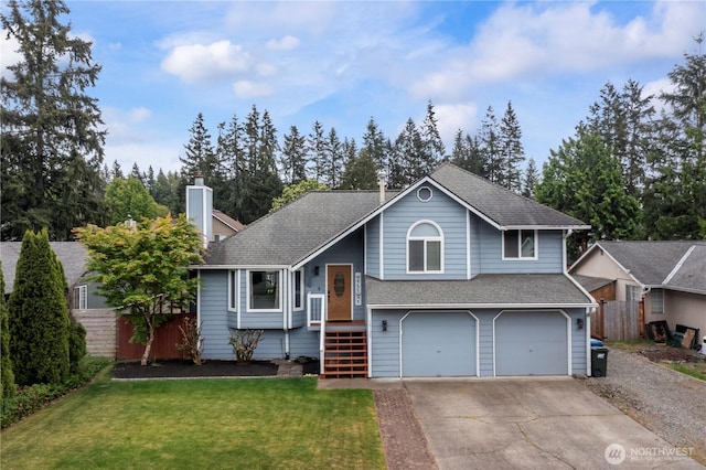 tri-level home with concrete driveway, a garage, roof with shingles, and a chimney