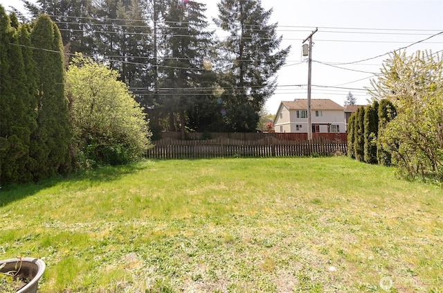 view of yard with fence