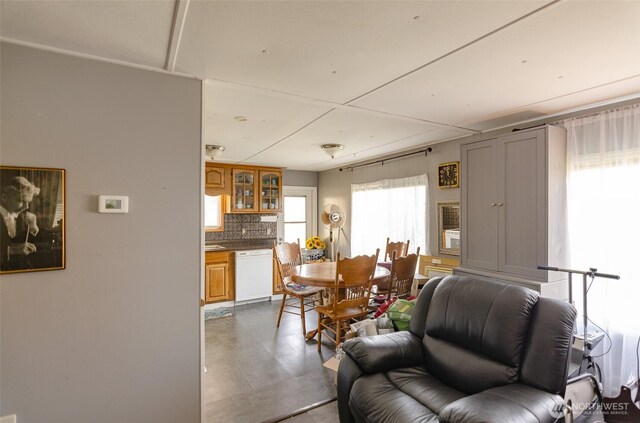 living area featuring concrete flooring