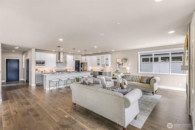 4888 194th Ave SE, Issaquah, WA 98027 - living room with recessed lighting, dark wood finished floors, and baseboards