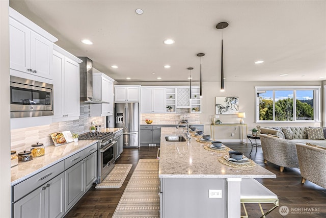 4888 194th Ave SE, Issaquah, WA 98027 - kitchen featuring high end appliances, open shelves, a sink, wall chimney exhaust hood, and open floor plan