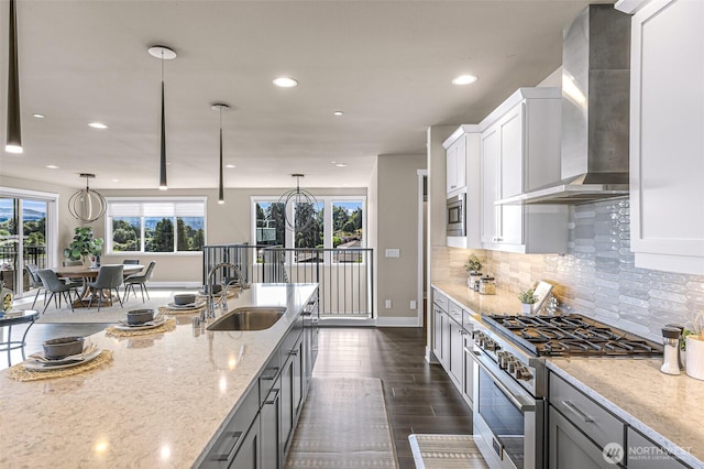 4888 194th Ave SE, Issaquah, WA 98027 - kitchen with wall chimney exhaust hood, appliances with stainless steel finishes, a wealth of natural light, and a sink