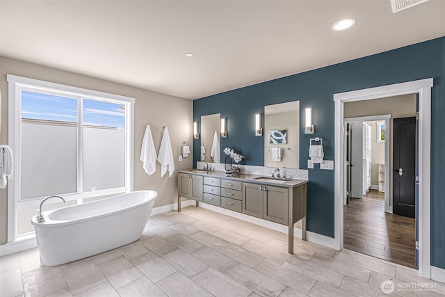 4888 194th Ave SE, Issaquah, WA 98027 - full bath featuring a sink, recessed lighting, double vanity, and a freestanding bath