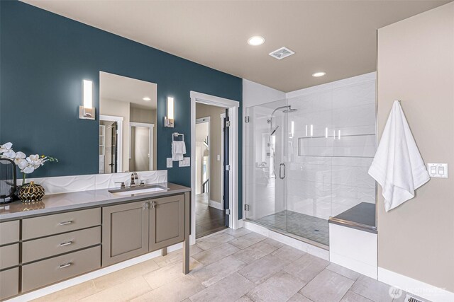4888 194th Ave SE, Issaquah, WA 98027 - full bathroom with baseboards, visible vents, recessed lighting, a shower stall, and vanity
