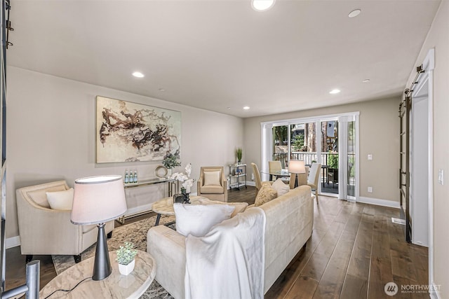 4888 194th Ave SE, Issaquah, WA 98027 - living room with a barn door, baseboards, dark wood-style flooring, and recessed lighting