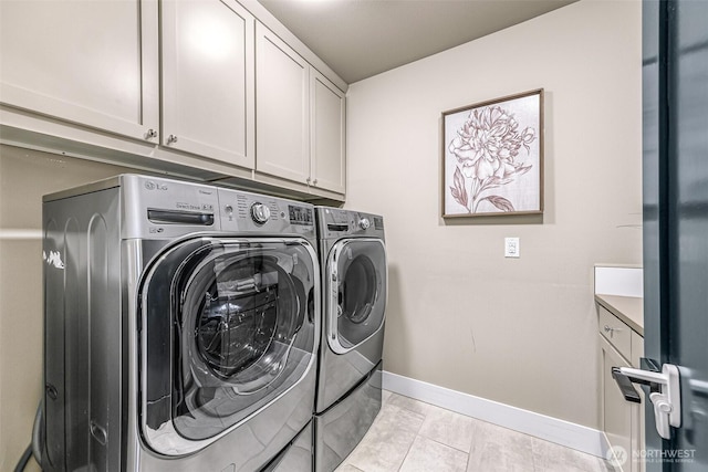4888 194th Ave SE, Issaquah, WA 98027 - washroom featuring cabinet space, independent washer and dryer, and baseboards