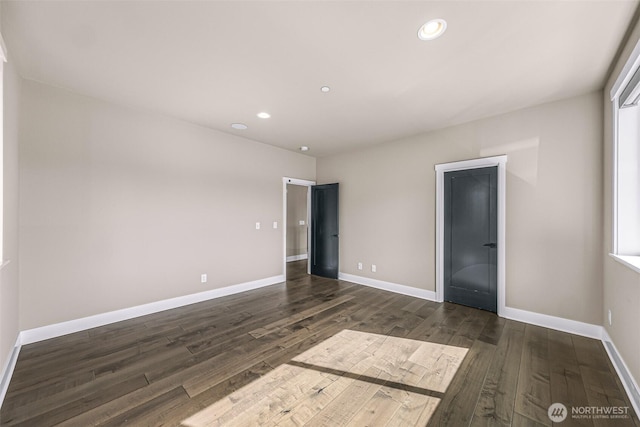 4888 194th Ave SE, Issaquah, WA 98027 - unfurnished bedroom with baseboards, wood finished floors, and recessed lighting