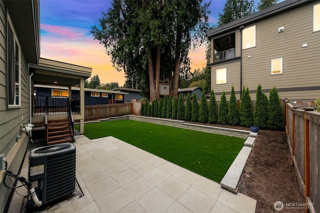 4888 194th Ave SE, Issaquah, WA 98027 - view of yard with a fenced backyard, central AC unit, and a patio