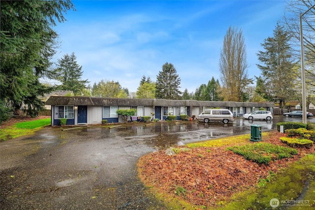 single story home with uncovered parking