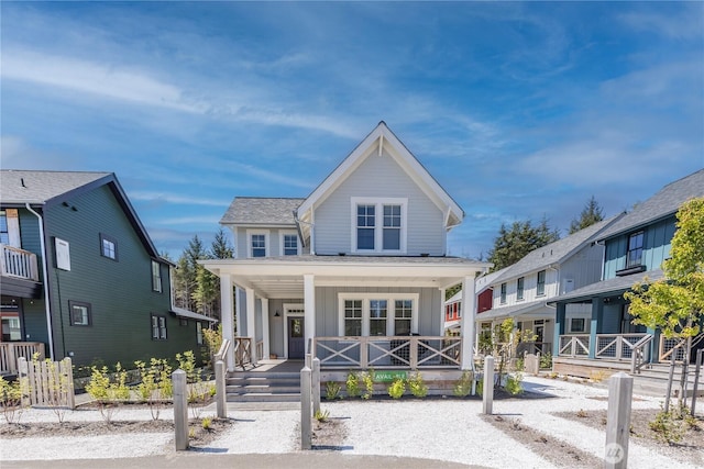 view of front of house with board and batten siding and covered porch
