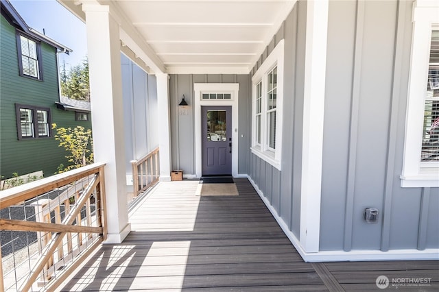 property entrance with board and batten siding