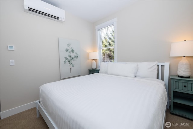 carpeted bedroom with baseboards and a wall mounted AC
