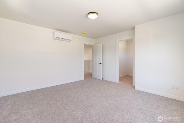 4226 Melrose Ln, Bellingham, WA 98226 - unfurnished bedroom with a wall mounted air conditioner, light colored carpet, and baseboards