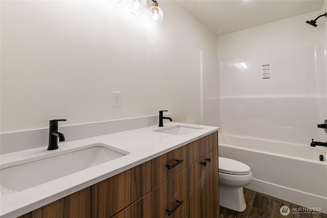 4226 Melrose Ln, Bellingham, WA 98226 - full bathroom with toilet, wood finished floors, shower / bathtub combination, and double vanity