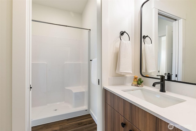 4226 Melrose Ln, Bellingham, WA 98226 - bathroom with vanity, walk in shower, and wood finished floors