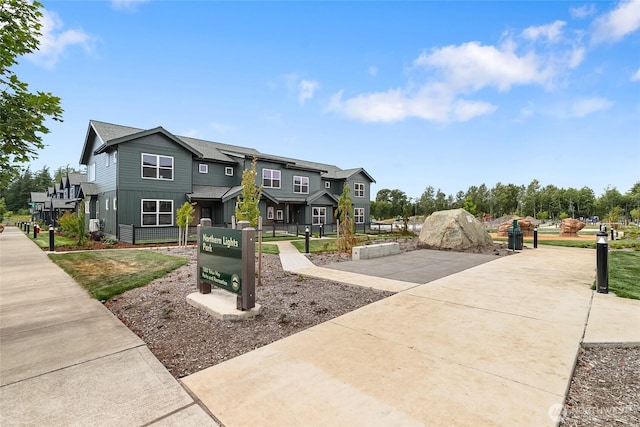 4226 Melrose Ln, Bellingham, WA 98226 - view of front facade with board and batten siding, roof with shingles, and a residential view