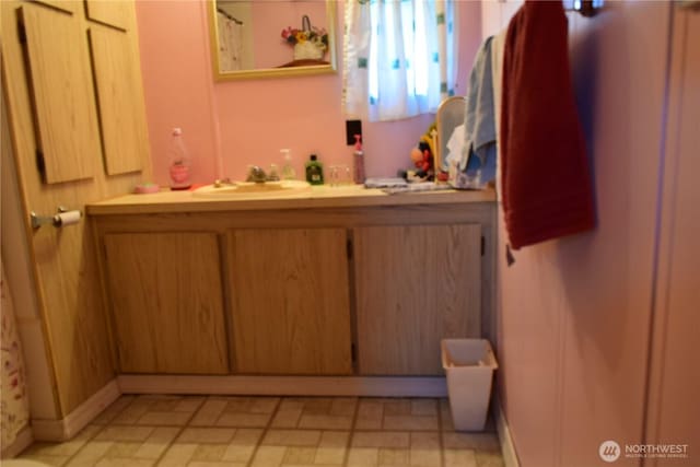 5317 208th St E, Spanaway, WA 98387 - full bathroom featuring vanity and baseboards