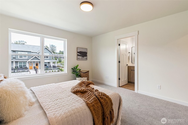 4228 Melrose Ln, Bellingham, WA 98226 - carpeted bedroom with baseboards and connected bathroom