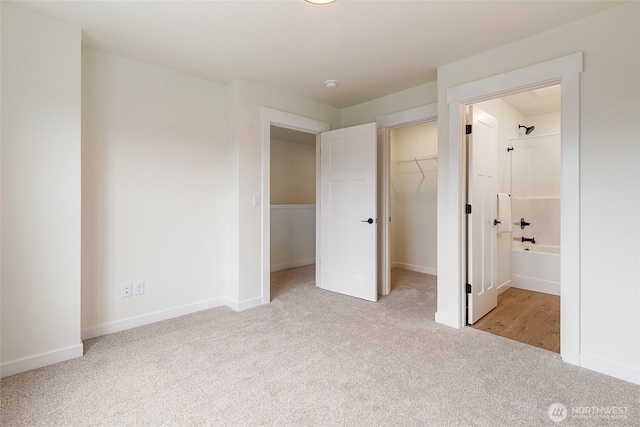 4228 Melrose Ln, Bellingham, WA 98226 - unfurnished bedroom with carpet flooring, a closet, a spacious closet, and ensuite bath