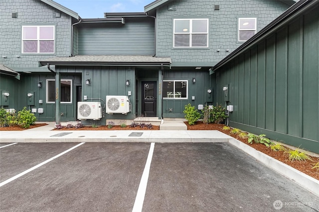 4228 Melrose Ln, Bellingham, WA 98226 - view of front facade featuring board and batten siding, uncovered parking, and roof with shingles